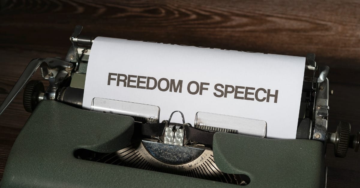 Typewriter with free speech typed onto paper.